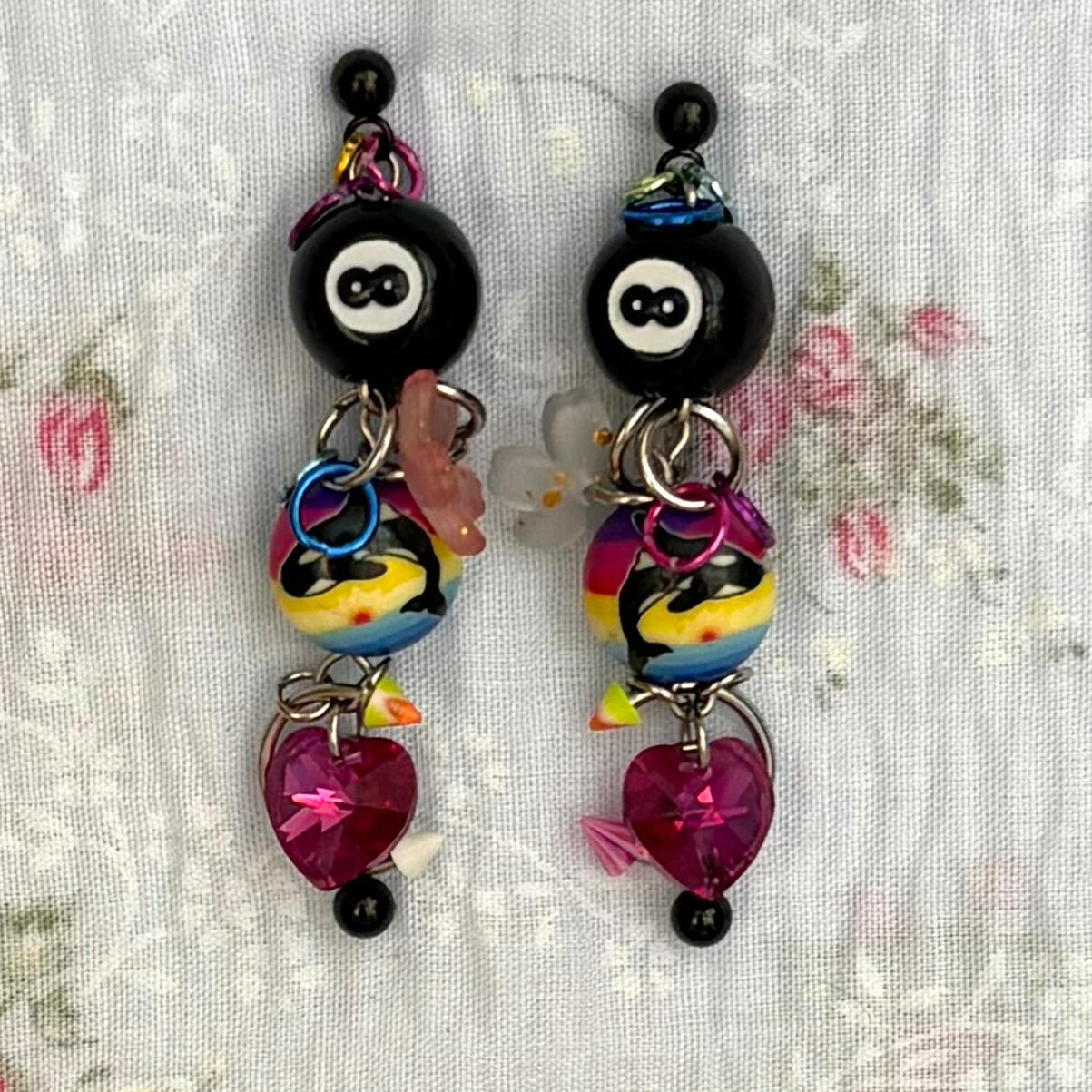 inspired by treasures hidden deep within the spaces we often neglect. featuring eight-ball beads, clay killer whale beads, piercing jewellery, swarovski crystal hearts, and stainless steel hardware.